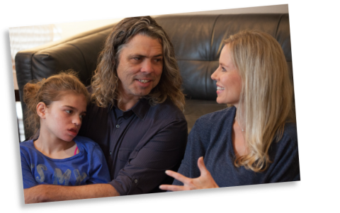 Riley with her parents